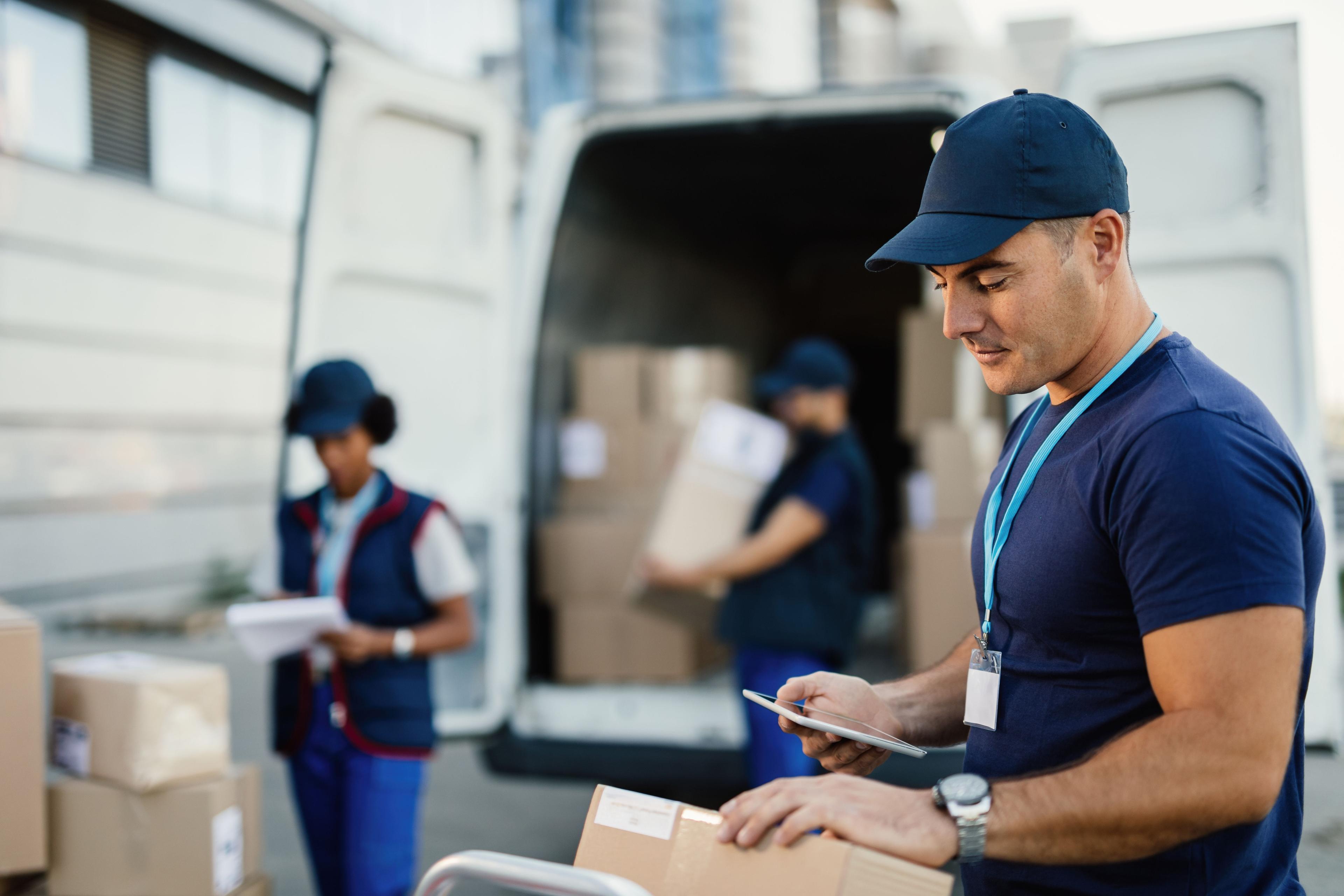 FFF delivery team loading parcels into a van
